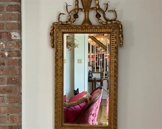 Pair of vintage ornate gold mirrors with metal floral accents. Each measures 61"H x 22"W. Photo 1 of 3