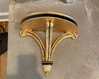 Gold wall-mount accent shelf