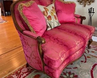 Two Francesca settees upholstered in pink silk fabric. Each measures 51"W x 41"H x 24"D. In excellent condition. Photo 2 of 3