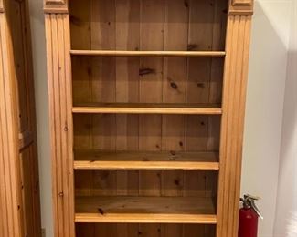 Set of two pine bookshelves. Each measures 48"W x 72"H x 13"D