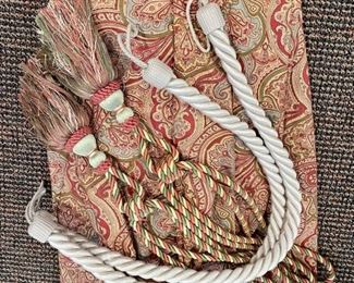 Two paisley curtain panels with tie backs