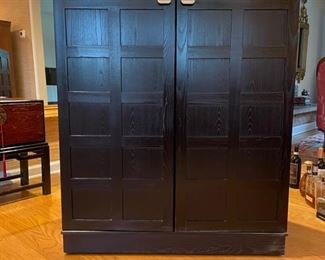 Crate & Barrel wine storage unit/bar on casters. Measures 36"W x 42"H x 22"D when closed. 72"W when fully open. Photo 1 of 2