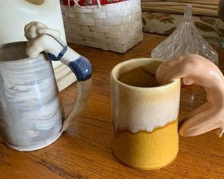 Pinup Handle Mug, blue bikini. Maker unknown.  Nude Risqué Handled Mug, stamped. Unfortunately this one has been repaired. 