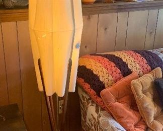 Mid-Century wood floor lamp, shade has some damage, there is a burn mark, some wear. It’s is not cracked or broken. 