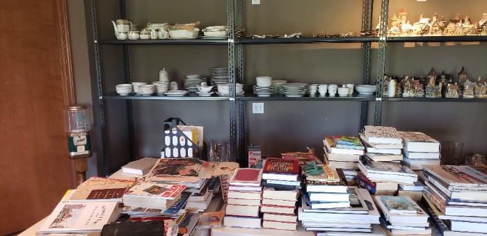 Shelves showing dishes and books
