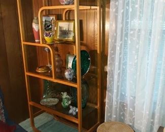 Vintage MOD bookshelf, cane seat stool, and vintage art.