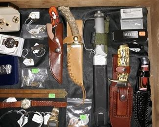 Collectible knives, men's watches, cuff links, Masonic pins and ring, money clips, 1950's Army Artillery awards and medals, folding yardstick, and more.
