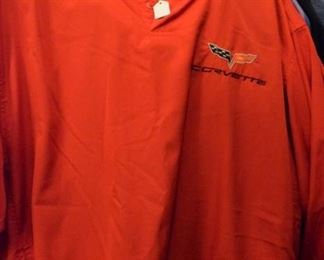 Several jackets and windbreakers with Corvette or Chevrolet dealership logos.