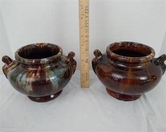 Matching pair of pottery home decor vases