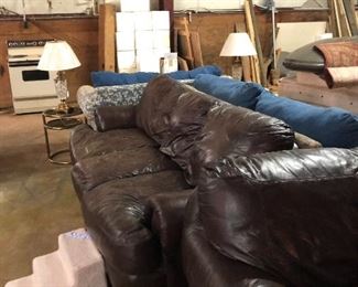 Brown leather sofa and loveseat.