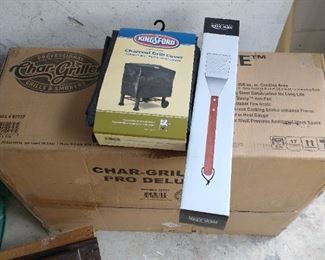 Chargriller/smoker with cover and grilling tools. New in box.