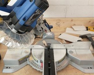 Miter saw with laser guide