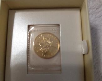 1/10 Oz Canadian maple leaf gold coin