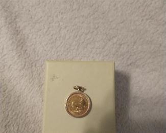 1/10 Oz Krugerrand gold coin in pendant setting