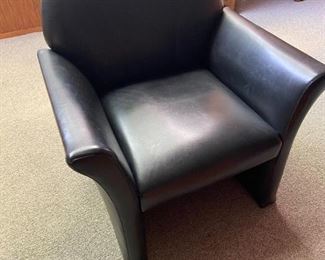 Two leather arm chairs