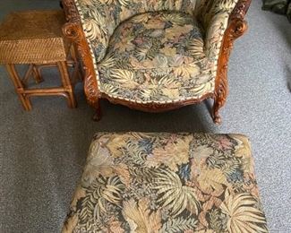 Hand carved antique club chair and foot stool.