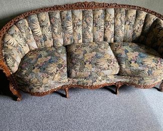 Hand carved antique couch circa 1920.