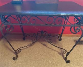 Iron scroll side table with leather top