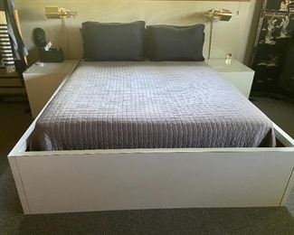 Queen bed with mattress and box spring including formica bed frame.