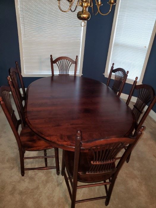 Custom built birch dining set w 1 leaf from Canadel.  $950