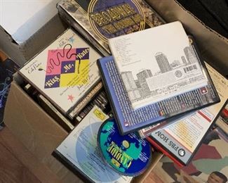 CDs, DVDs, some in shrink