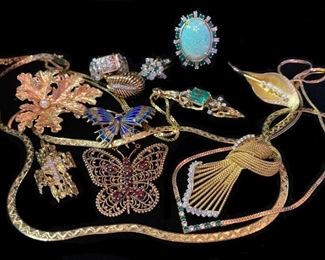 Opals, diamonds, emeralds, and gold jewelry