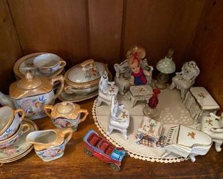 Miniature porcelain tea set and furniture