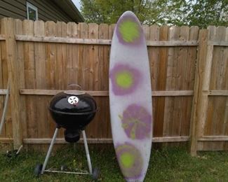 Surf Board and Charcoal Grill