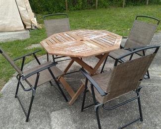 Small Wooden Patio Table with folding chairs