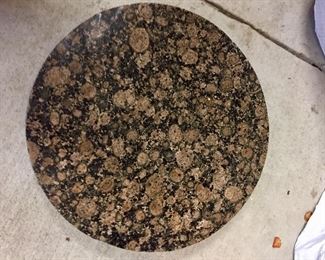 What in the world is that?  Well, it's a round stone - thick and heavy