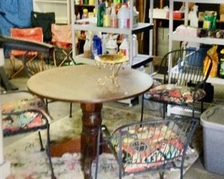 Iron chairs, wooden table, great for painting