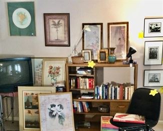 Cabinet, books, office chairs, tv, lots of framed items