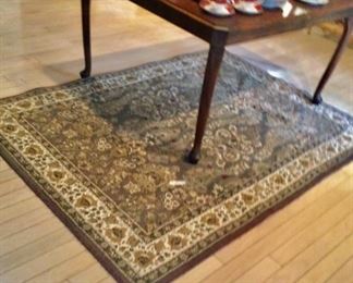 Nice wool rug, dining table, collectors plate, large ginger jar