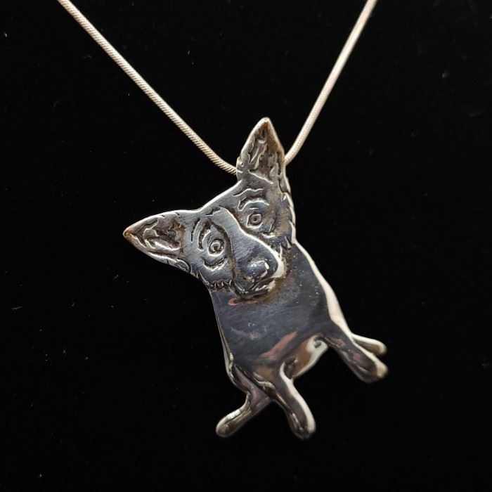 Louisiana artist George Rodrigue's Blue Dog in sterling. Pendant and chain sold together.