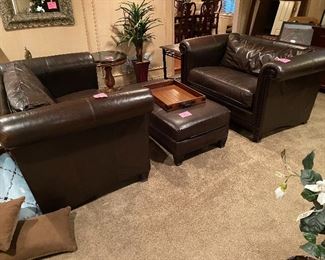 Pair of Bernhardt matching leather sofas and ottoman