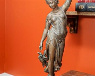 Brass vintage  figurine on pedestal