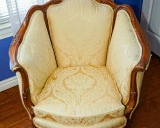 cream wingback upholstered chair