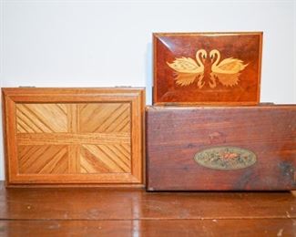 inlaid wooden boxes one musical, one with chess pieces
