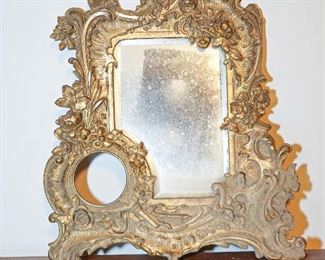 Vintage brass mirror with space for clock?