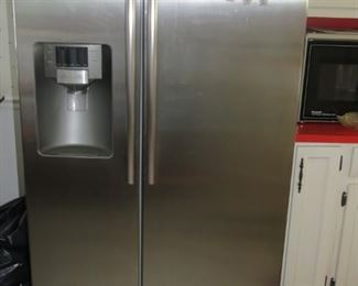 STAINLESS STEEL REFRIGERATOR..  AS IS CONDITION.