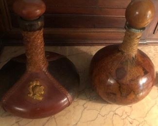 ITALIAN LEATHER WRAPPED DECANTERS.