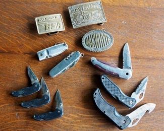 Brass Indian Motorcycle, BSA And Macwhite Belt Buckles And Assorted Pocket Knives