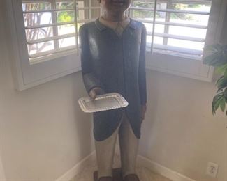 Carved wood butler, 150.00