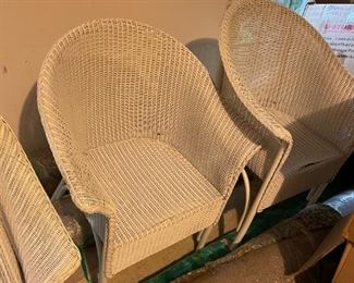 Six Wicker chairs