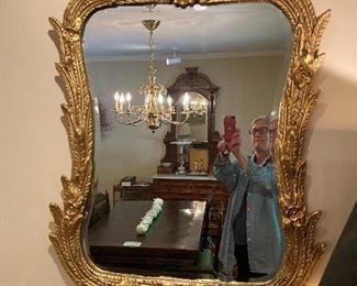 Gorgeous mirror! Carved wood and gold leaf