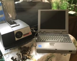 Vintage projector and CD player.  