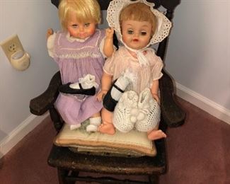 Several antique dolls in home