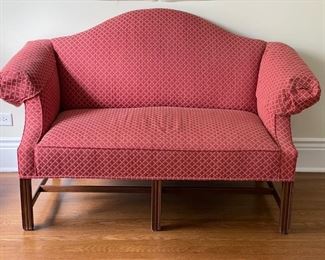 Raspberry Upholstered Settee with Scroll Arms, 58"W 32"H 19"D. Photo 1 of 2