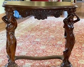 Antique carved mahogany demilune table purchased at DuMouchelles. Photo 1 of 2. 