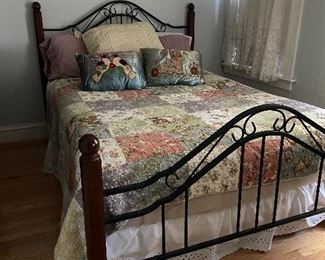 Wood and iron bed.  Queen size